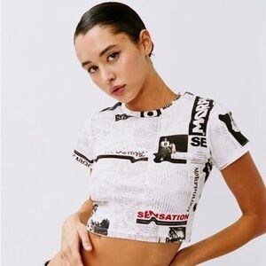 With Jean newspaper top